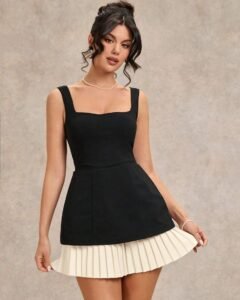 Vestido con detalles de volantes y pliegues a juego en blanco y negro