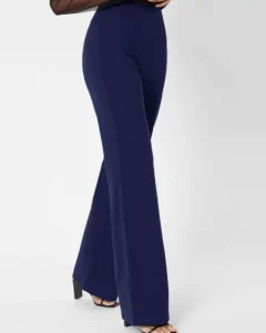 Pantalones palazzo unicolor con cremallera trasera