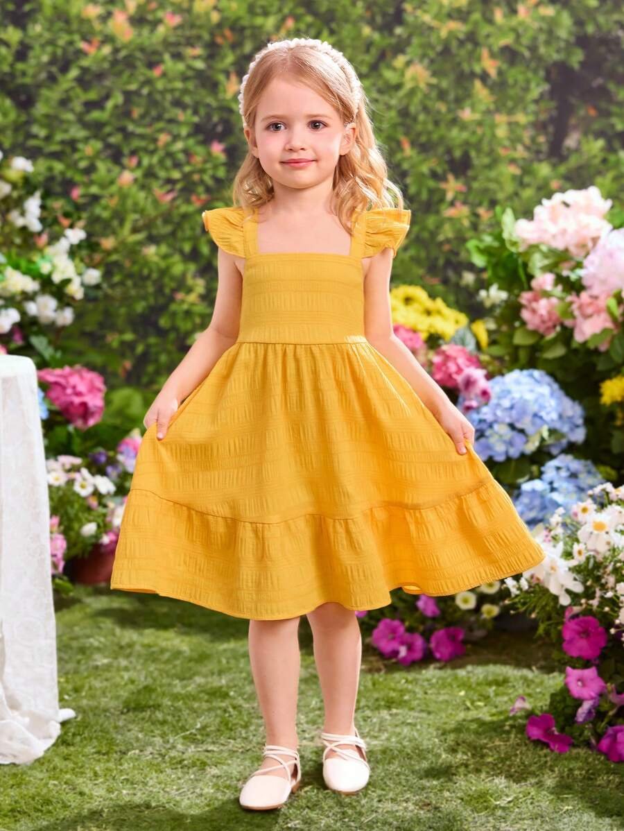 Vestido corto amarillo con volantes y mangas cortas - Imagen 2
