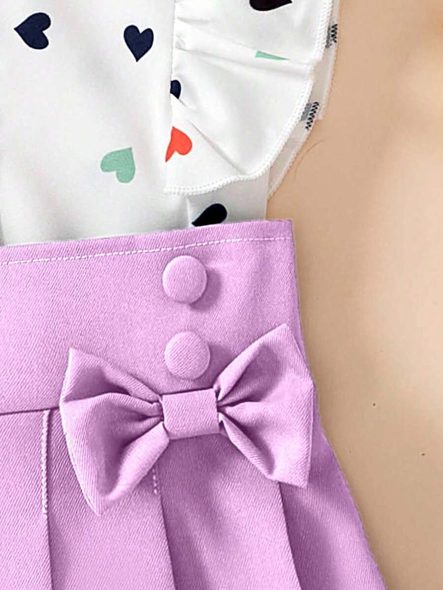 Blusa de manga con estampado y falda plisada con decoración de moño - Imagen 2