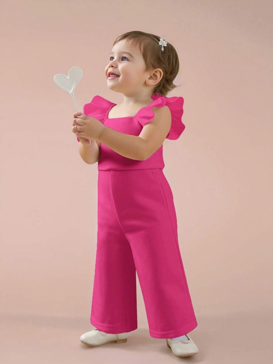 Pelele de una pieza de bebé niña con volantes de organza en contraste