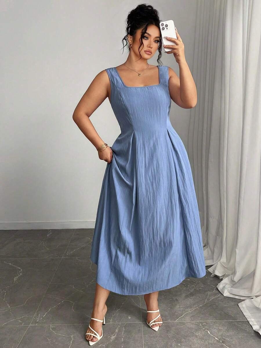 Vestido elegante con cuello cuadrado y cintura ceñida