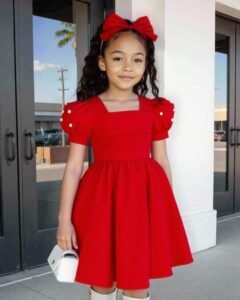 Vestido de punto con cuello cuadrado, mangas abultadas y cuentas