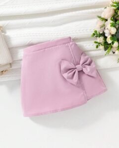 Falda elegante con volantes y lazo para niñas