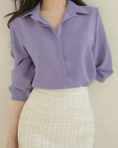 Blusa con botones frontales lisos y de manga larga