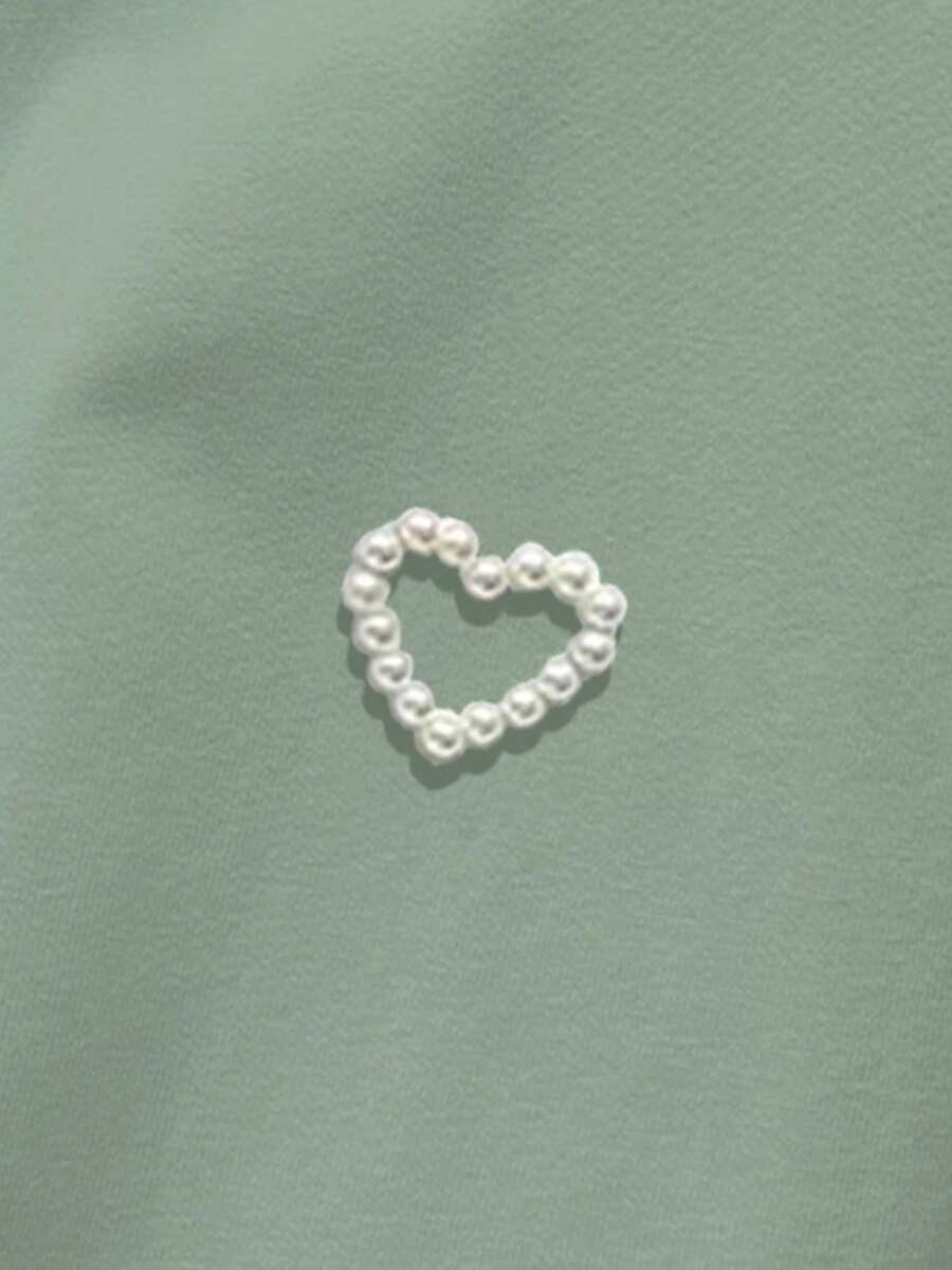 Camiseta de manga corta de unicolor con decoración de tachuelas - Imagen 2