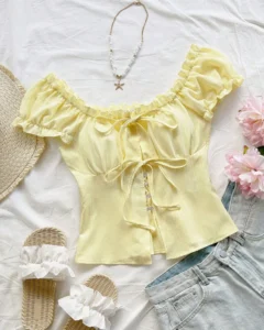 Blusa bohemia tropical con volantes y cintura con lazo