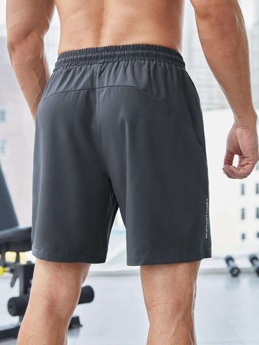 Shorts deportivos con bolsillo con cremallera y gráfico de letras - Imagen 2