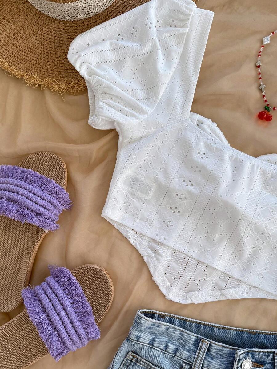 Blusa de punto texturizada con diseño de pecho plisado y abertura - Imagen 2