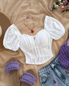 Blusa de punto texturizada con diseño de pecho plisado y abertura