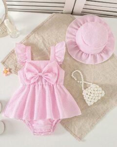 Pelele de rayas para bebé niña con gran lazo decorativo
