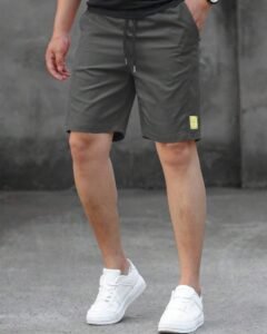Pantalones cortos holgados con cordón en la cintura y parche con letra