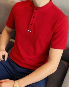 Camisa polo de punto holgada con bloques de color y rayas