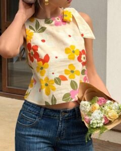 Top sin mangas con cuello alto y lazo delantero con estampado floral