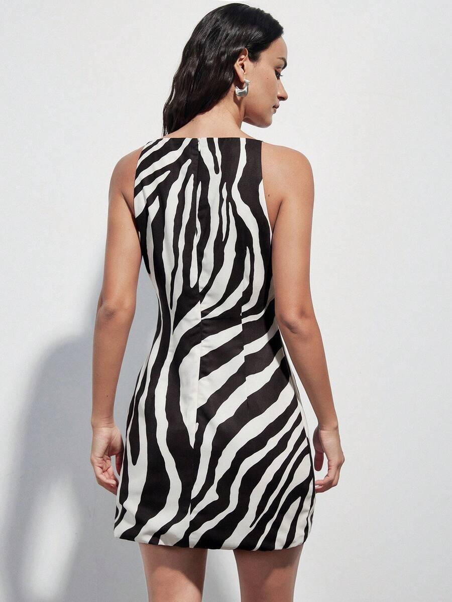 Vestido mini elegante de corte ceñido con estampado de cebra y hombros - Imagen 2