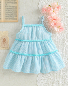 Vestido de bebé niña con rayas, volantes y flecos coloridos
