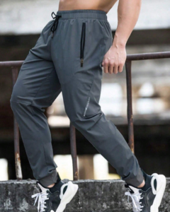 Pants deportivos con cintura con cordón y bolsillo con cremallera